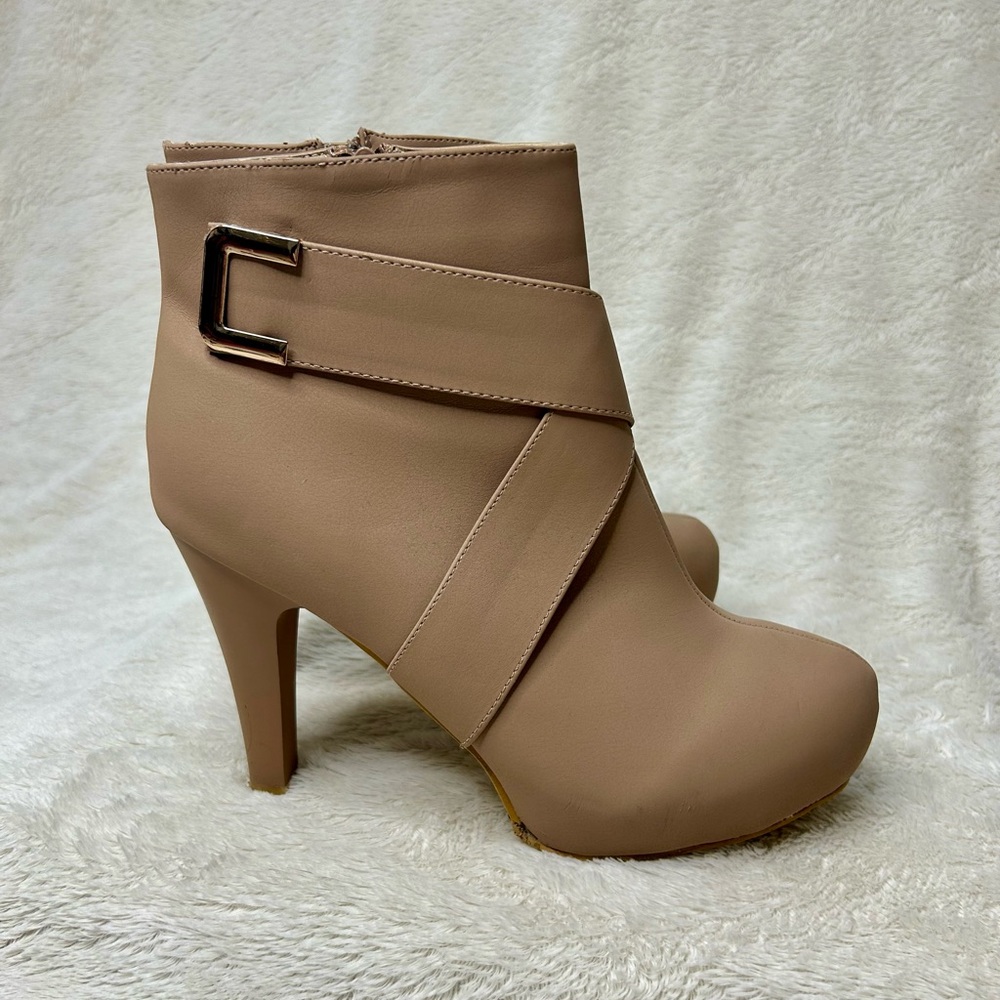 Tan high heel ankle boots with gold detailing